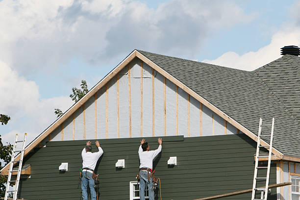 Professional Siding Replacement technician working in Orient, NY